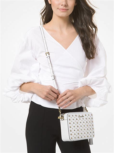 ovaal michael kors womans ginny studded|Ginny Medium Studded Pebbled Leather Crossbody Bag.